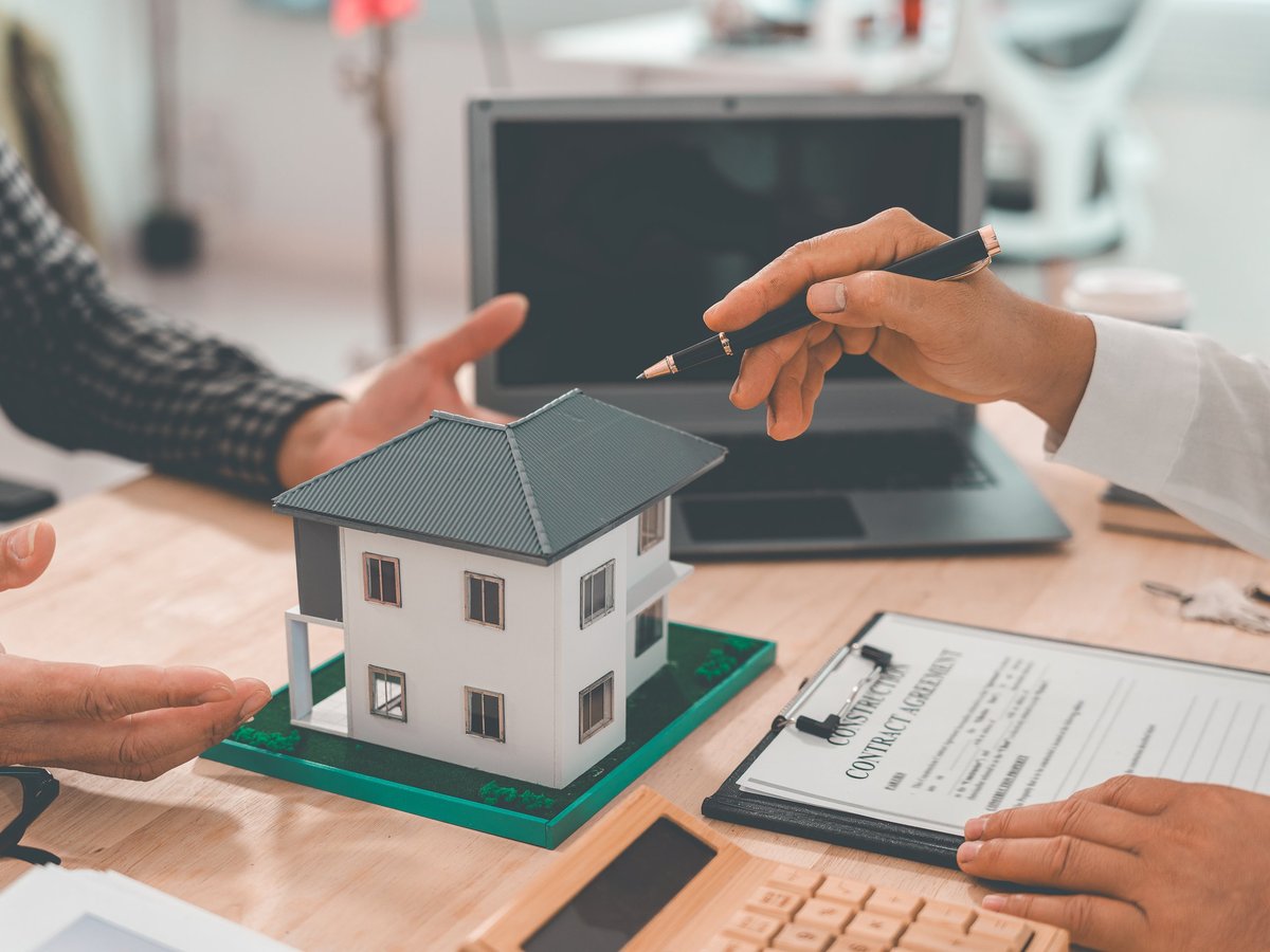 Reviewing paperwork for a property services agreement